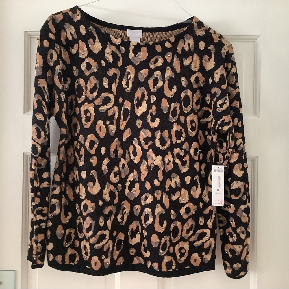 Chicos pullover sweater with metal beads.